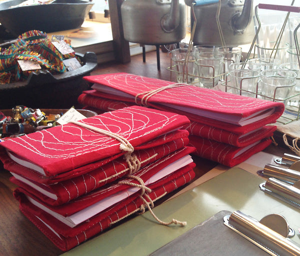Red Stitched Ledgers and Notebooks © 2015 Indika